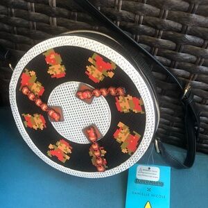 Danielle Nicole Black and White Crossbody Bag with Playful Design